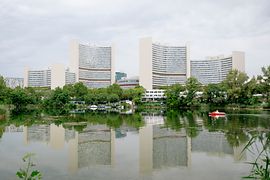 The buildings of the Vienna International Centre seen from across the Old Danube