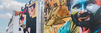 Wall paintings at Wiedner Hauptstrasse 78: Kruella d'Enfer interprets Schiele's "Female Nude Lying on her Stomach" and the Brazilian artist Kobra's "Klimt with Cat"
