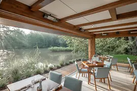 Restaurant with a view of a pond