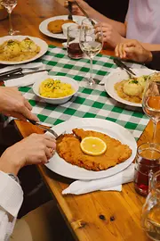 A well-laid table with different dishes of traditional Viennese cuisine
