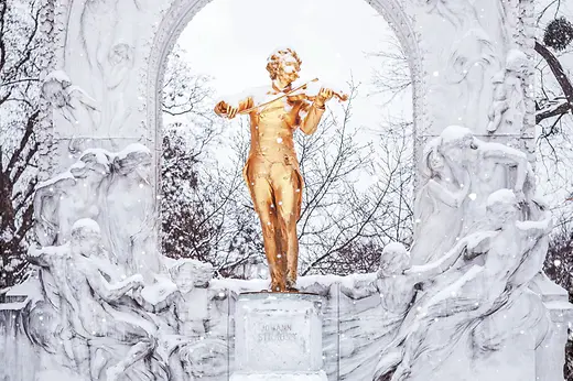 Johann Strauss monument in the city park in winter