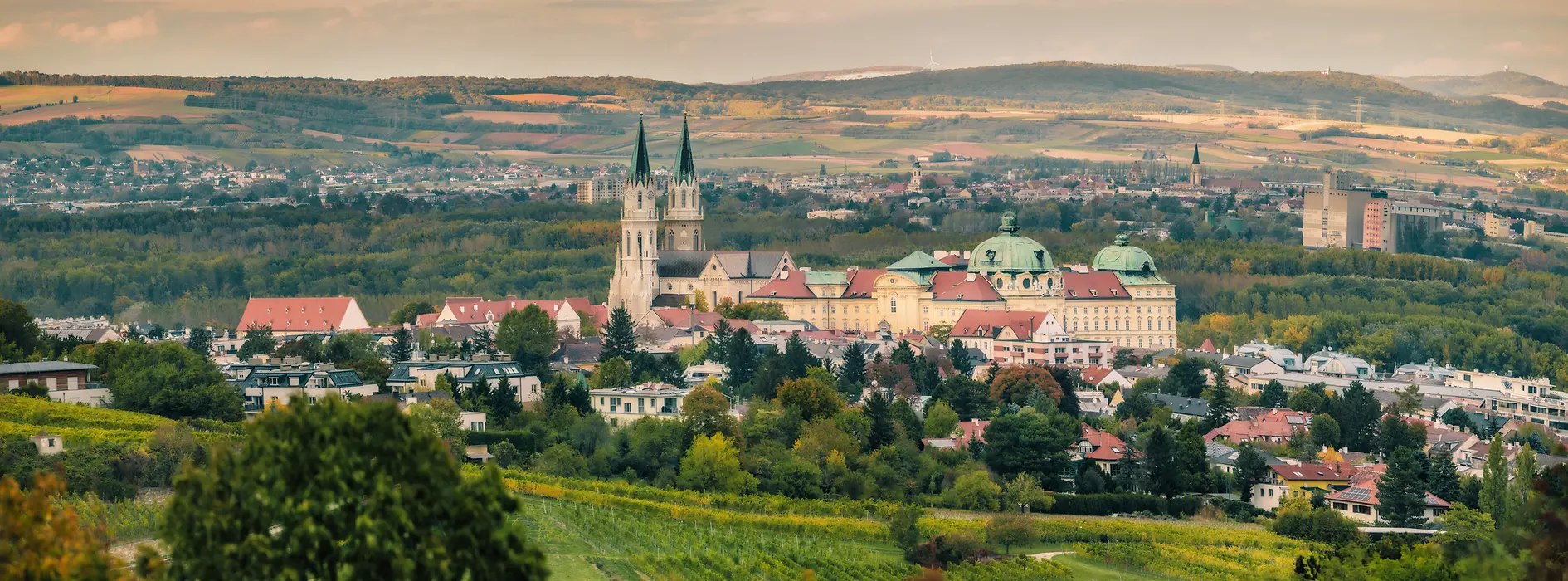 Klosterneuburg Abbey from a distance with landscape in the background