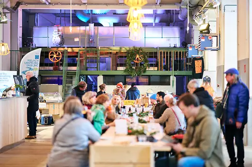 People sitting at a long dinner table