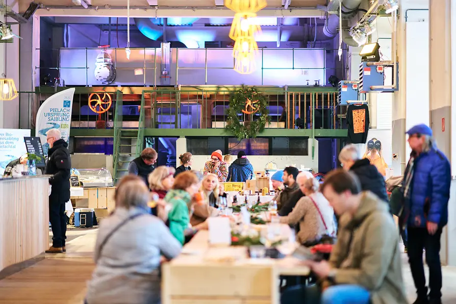 People sitting at a long dinner table