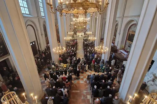 View from above of a solemn mass in the fully packed Augustinian Church.