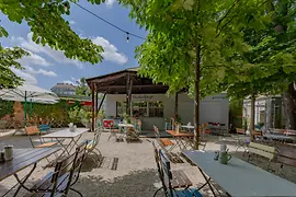 Schankwirtschaft in Augarten with shaded outdoor seating area