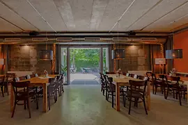 Interior of Schankwirtschaft in Augarten with view of the outdoor garden